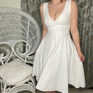 White midi dress from Lulu’s.